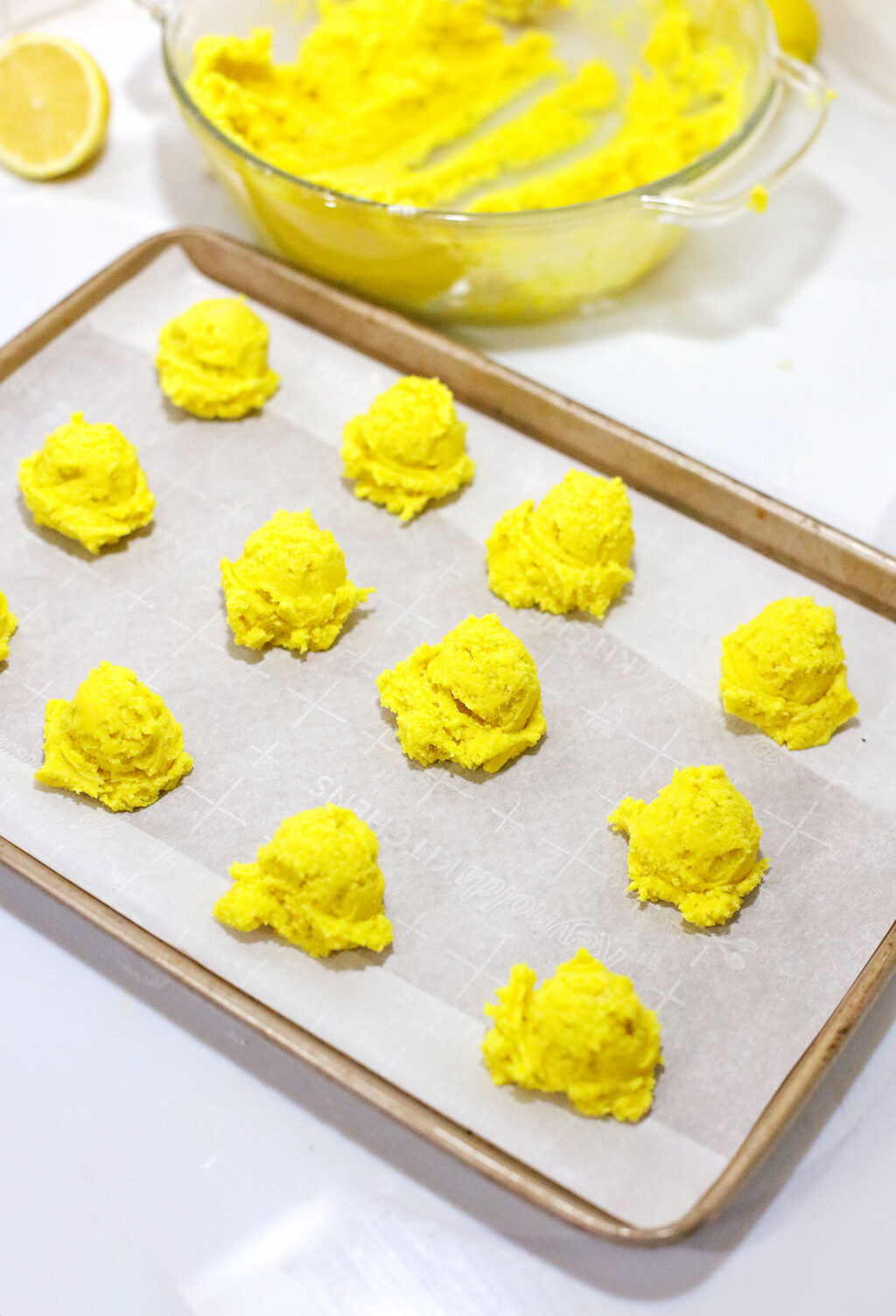 lemon cookie dough on baking sheet