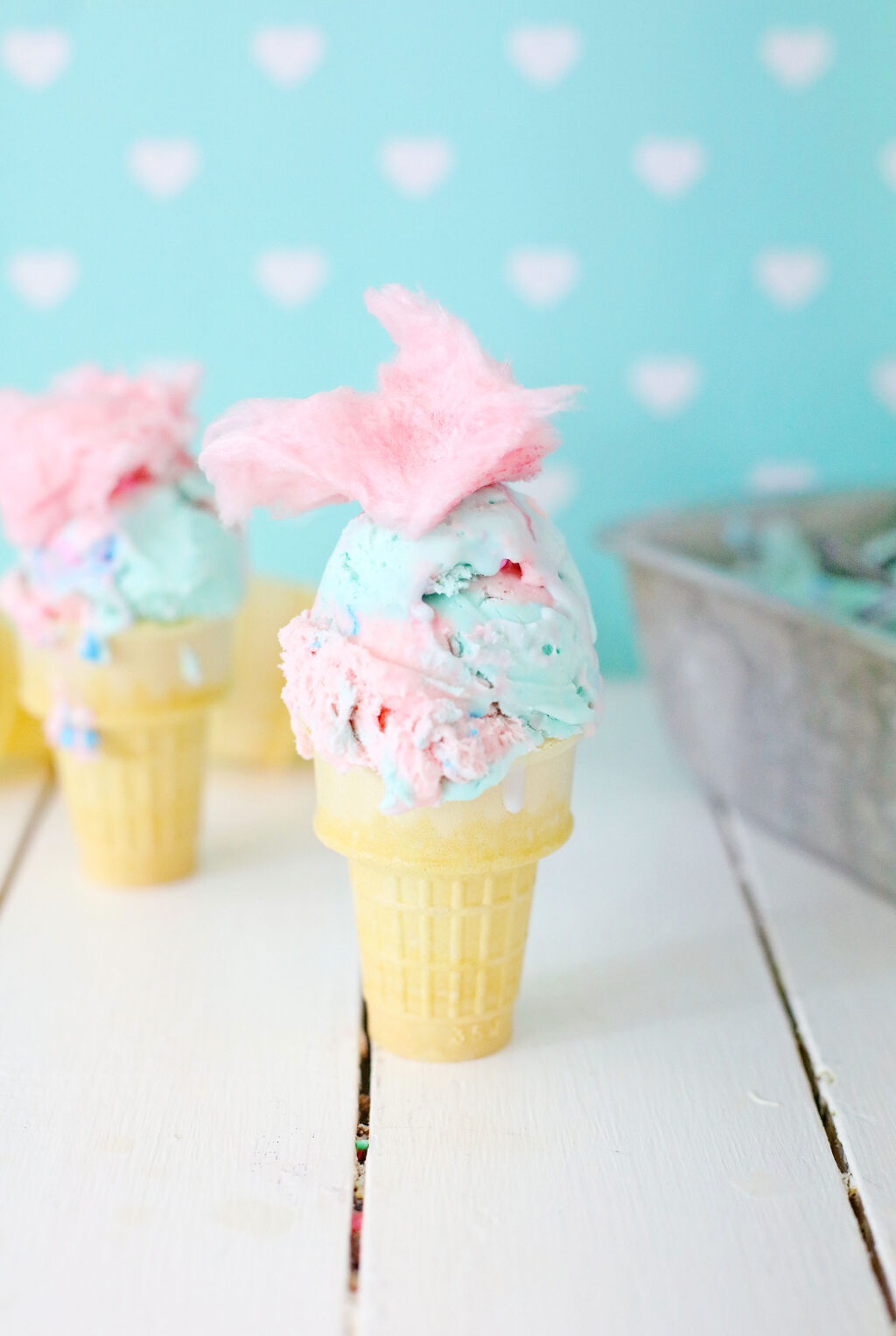 cotton candy ice cream in a sugar cone