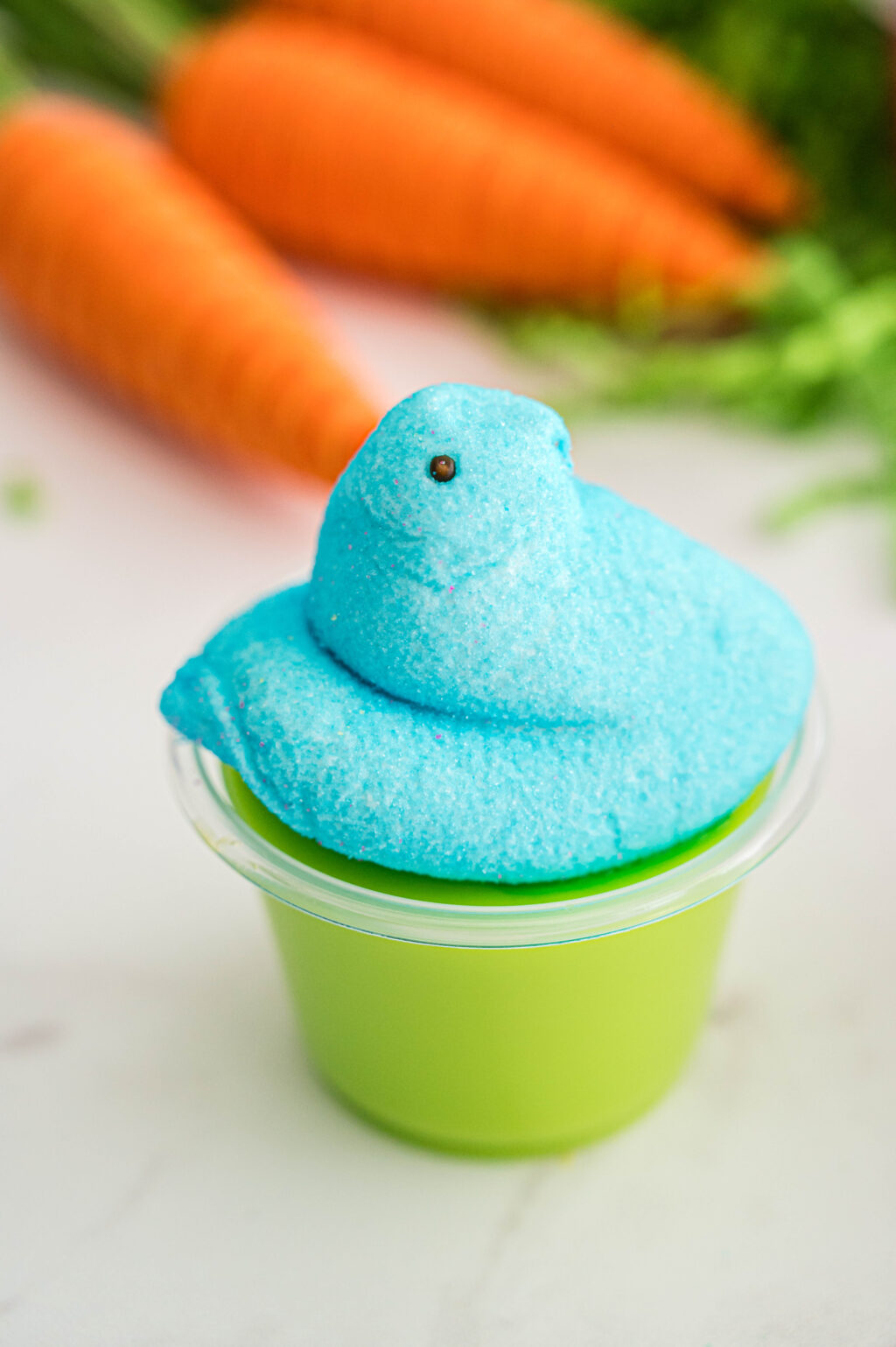 green and blue peeps jello shot on a table