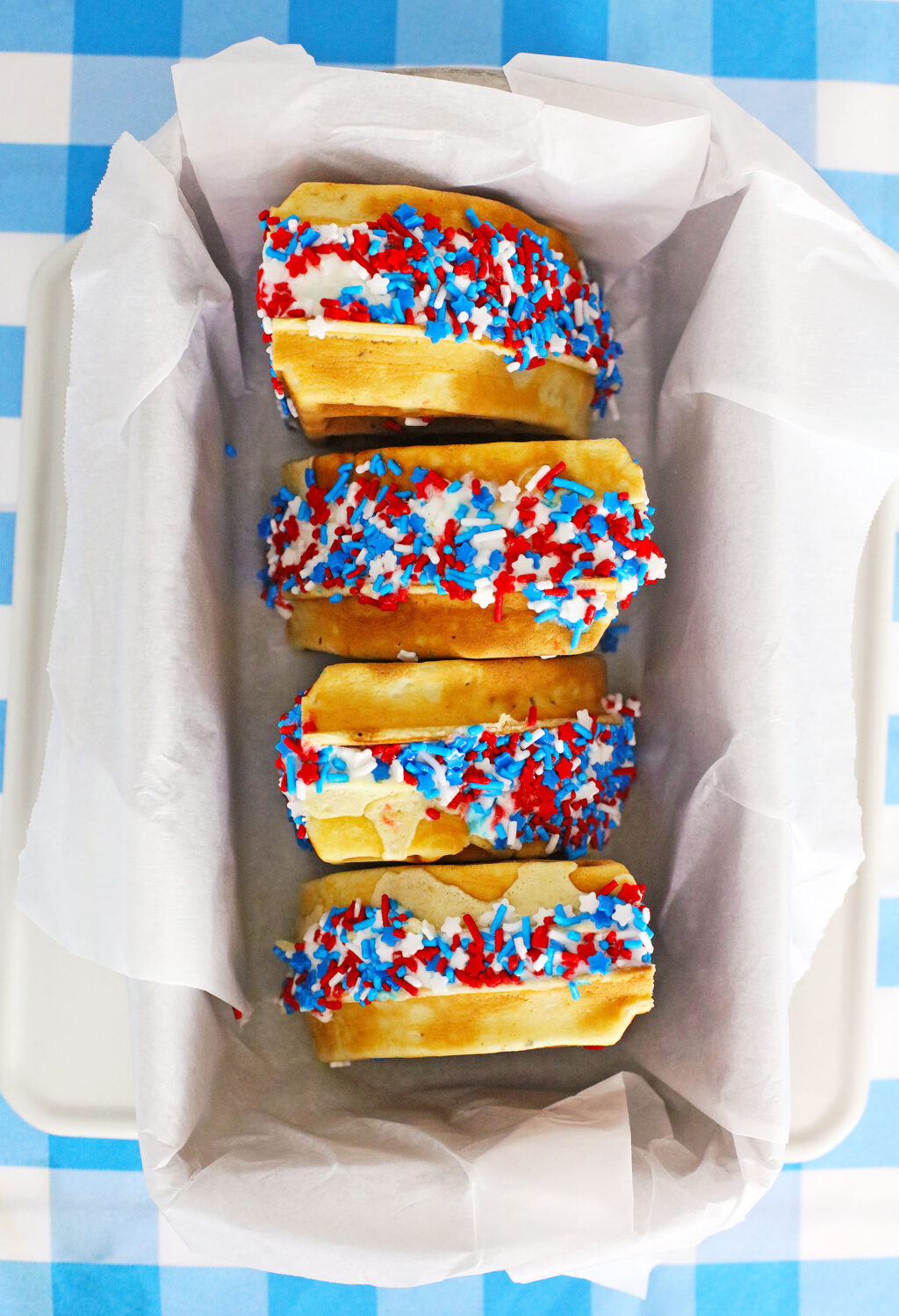 waffle ice cream sandwiches inside a large pan