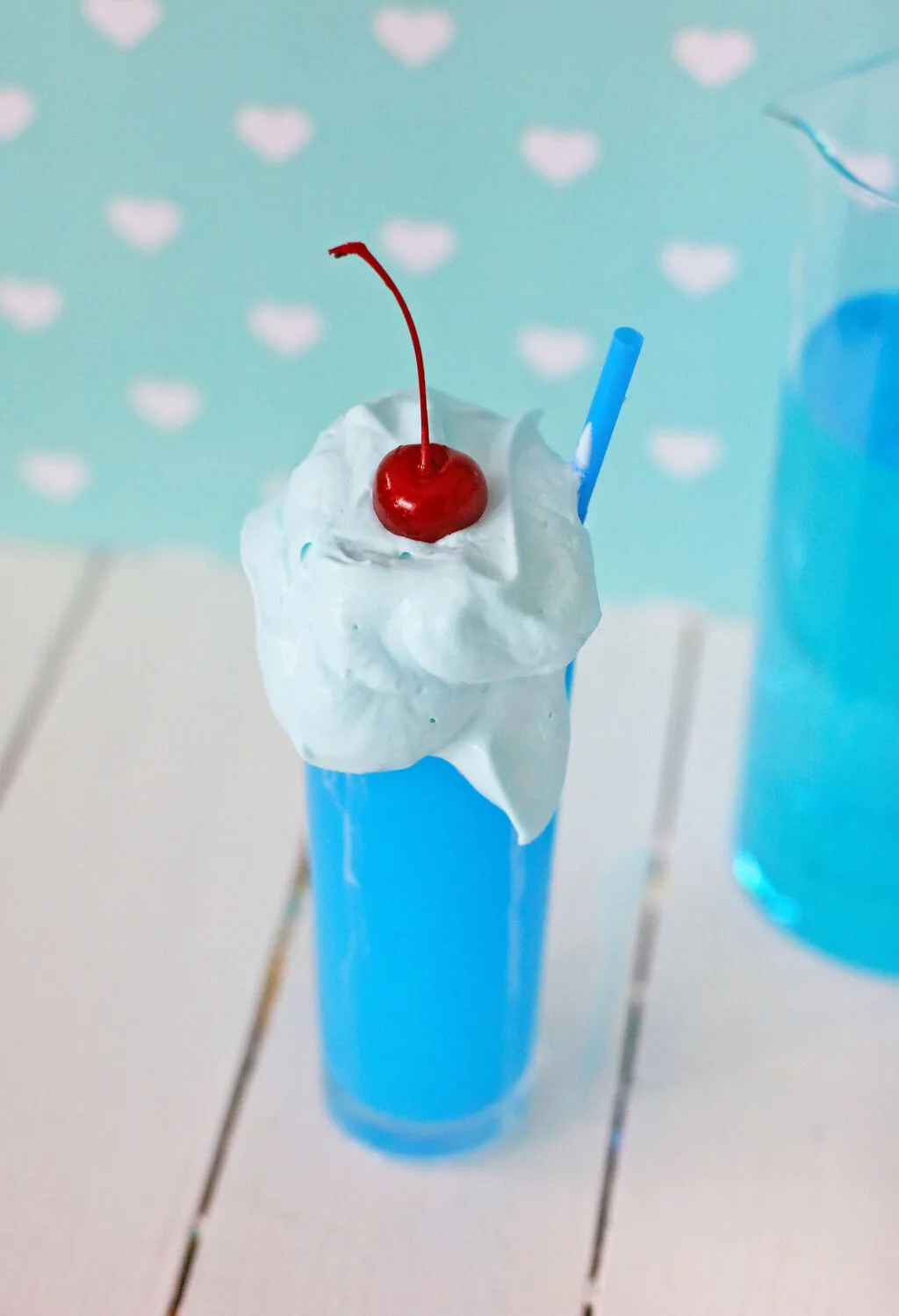 blue whipped kool-aid in a tall glass