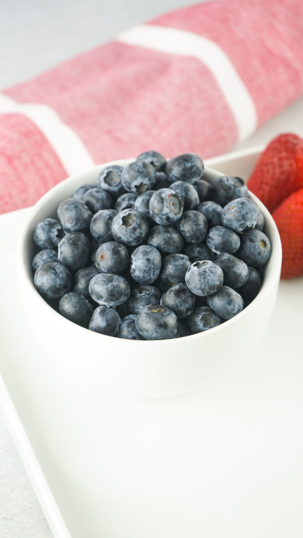 fresh blueberries in small white bowl