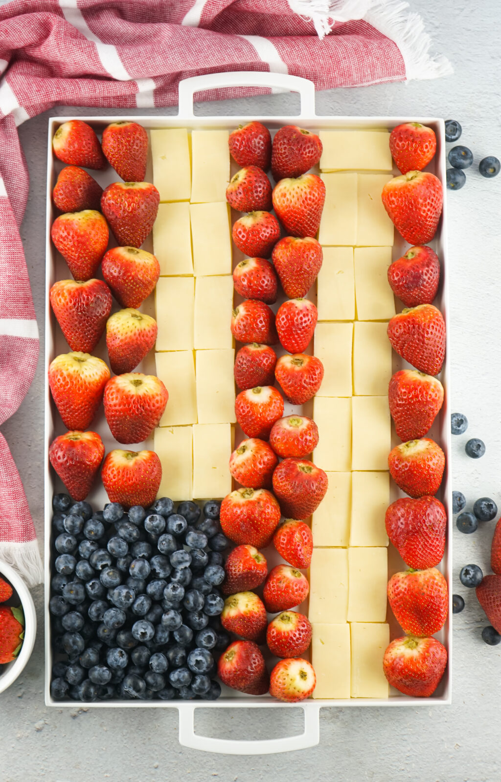 patriotic charcuterie board on a large white serving tray