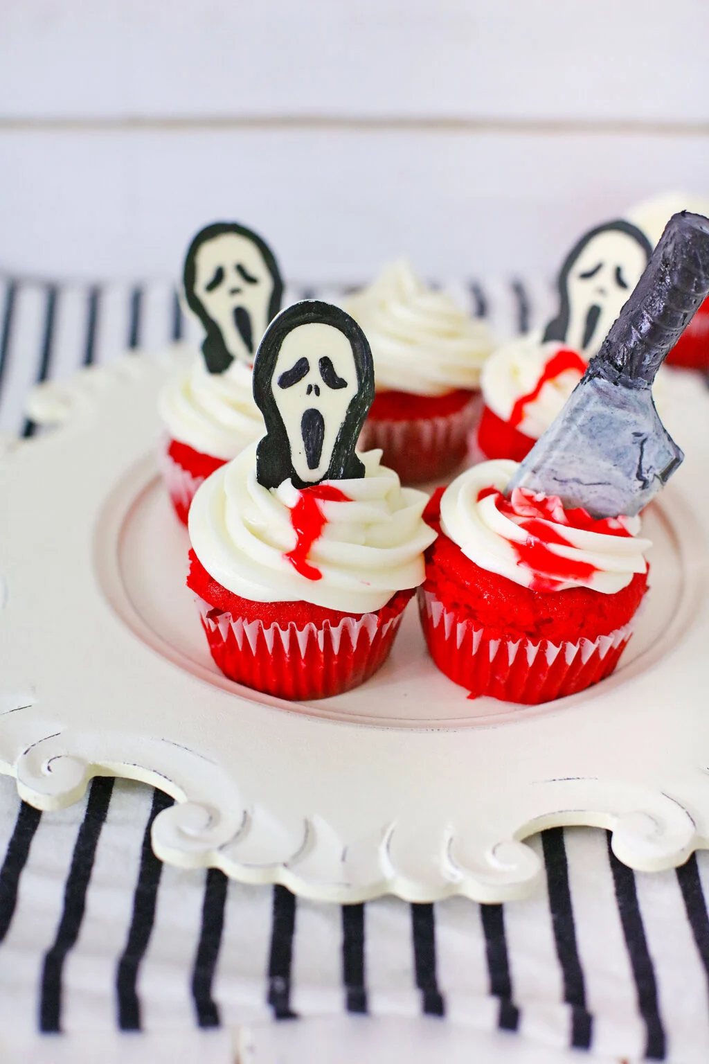scream cupcakes on a round white plate