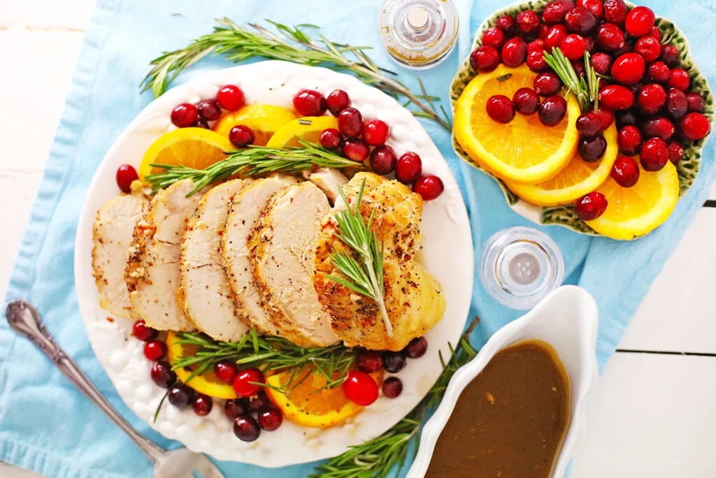 crockpot turkey breast sliced on large serving platter