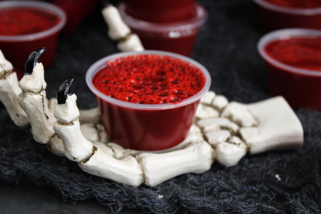bloody jello shots on halloween table