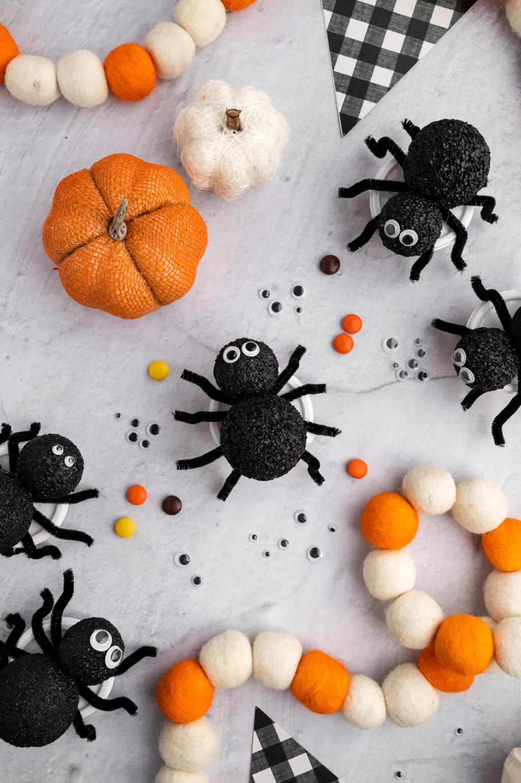 spider treat containers on concrete counter 