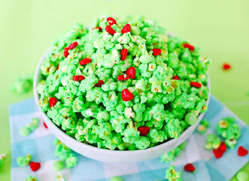 green grinch popcorn in large white bowl