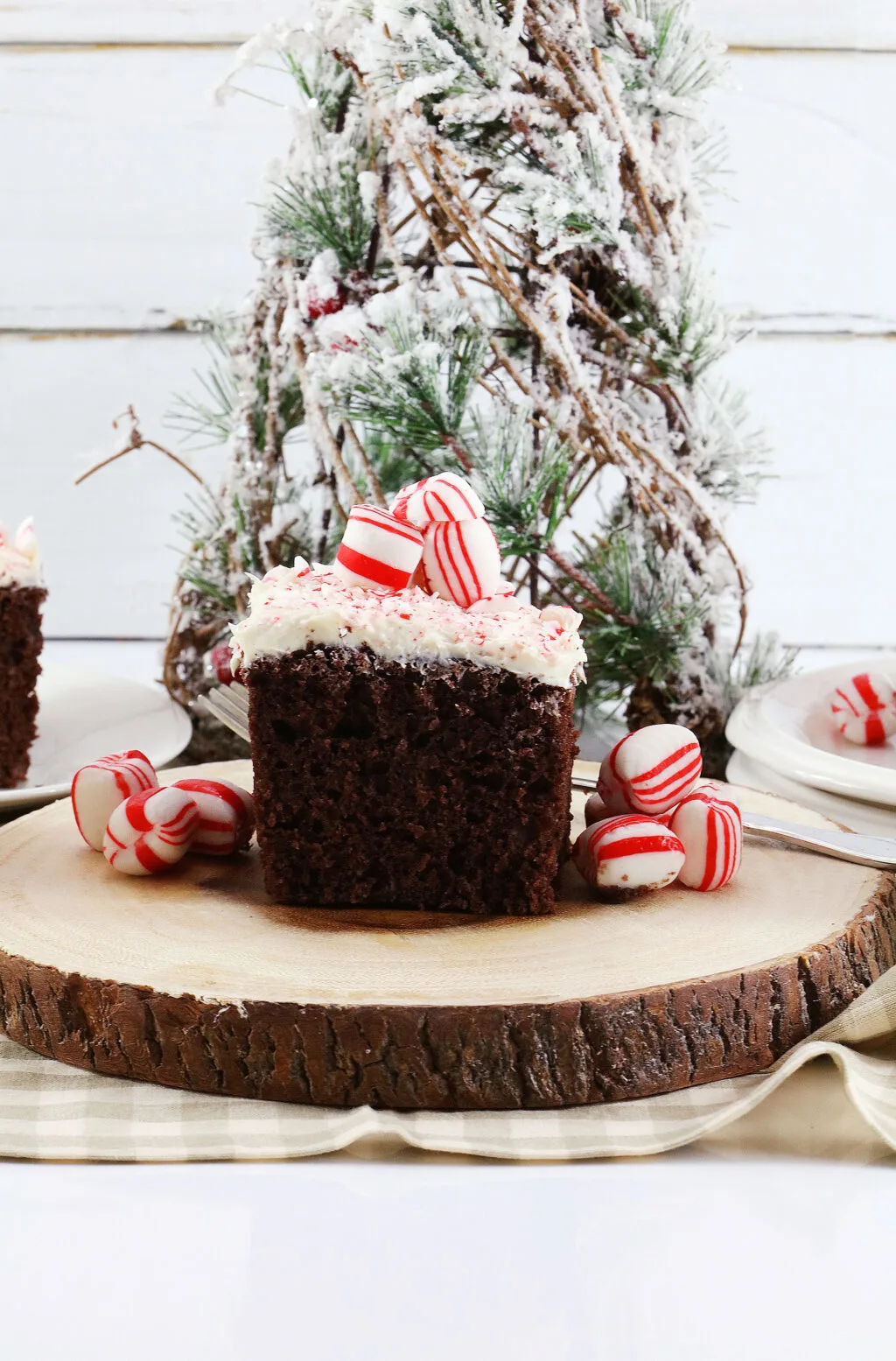 slice of peppermint snack cake on a wooden serving tray