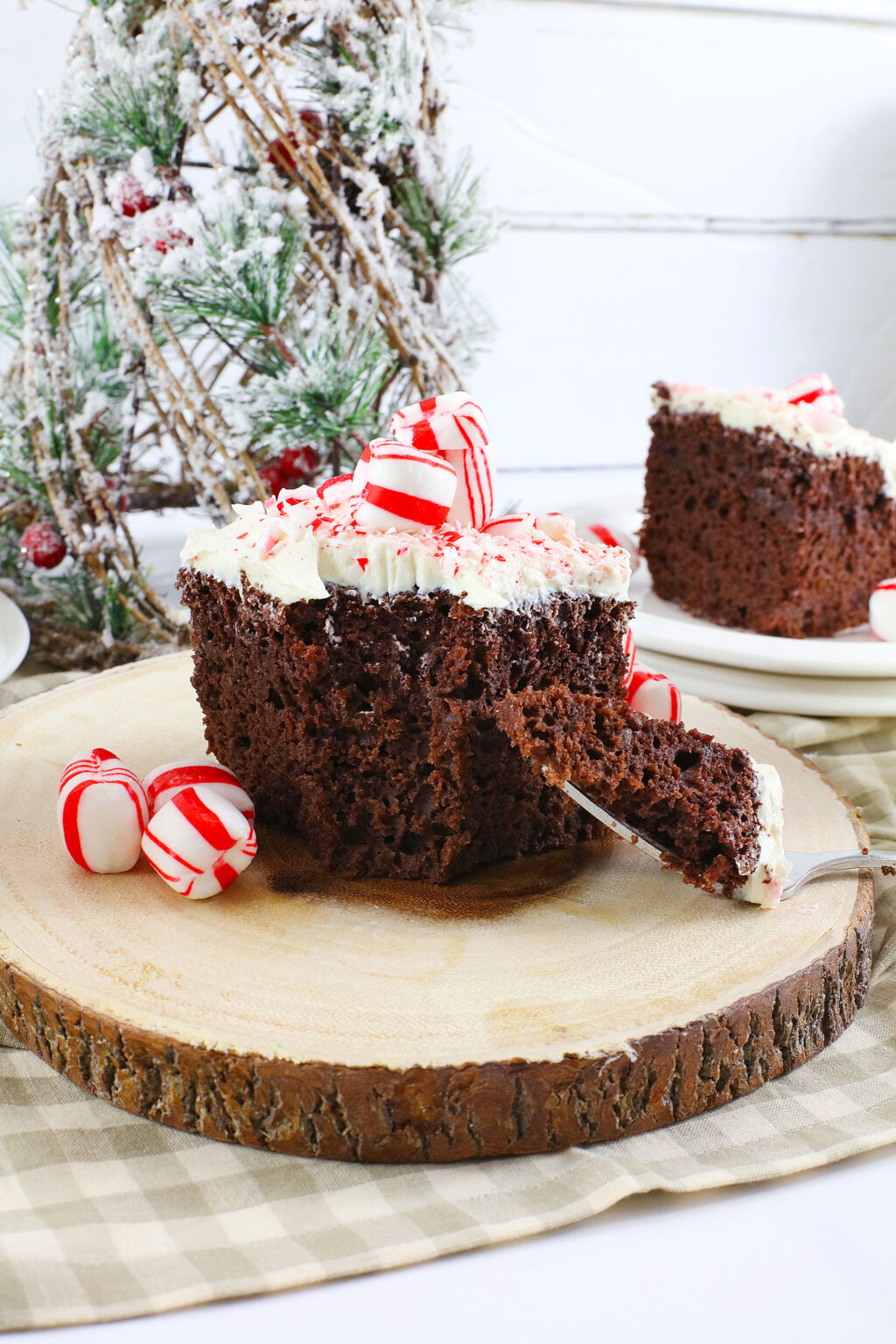 slice of peppermint snack cake on wood serving tray