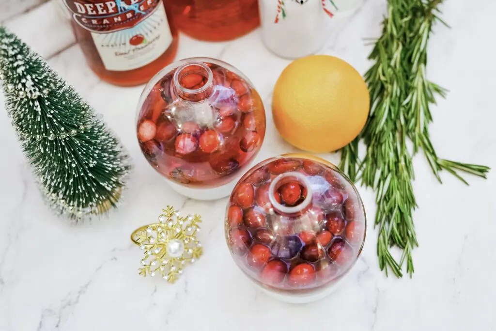 cranberry juice cocktail inside christmas ornament