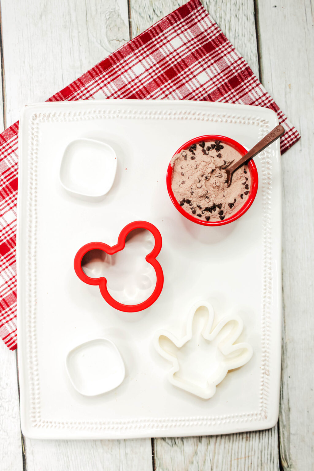 mickey mouse hot cocoa board with ingredients on it