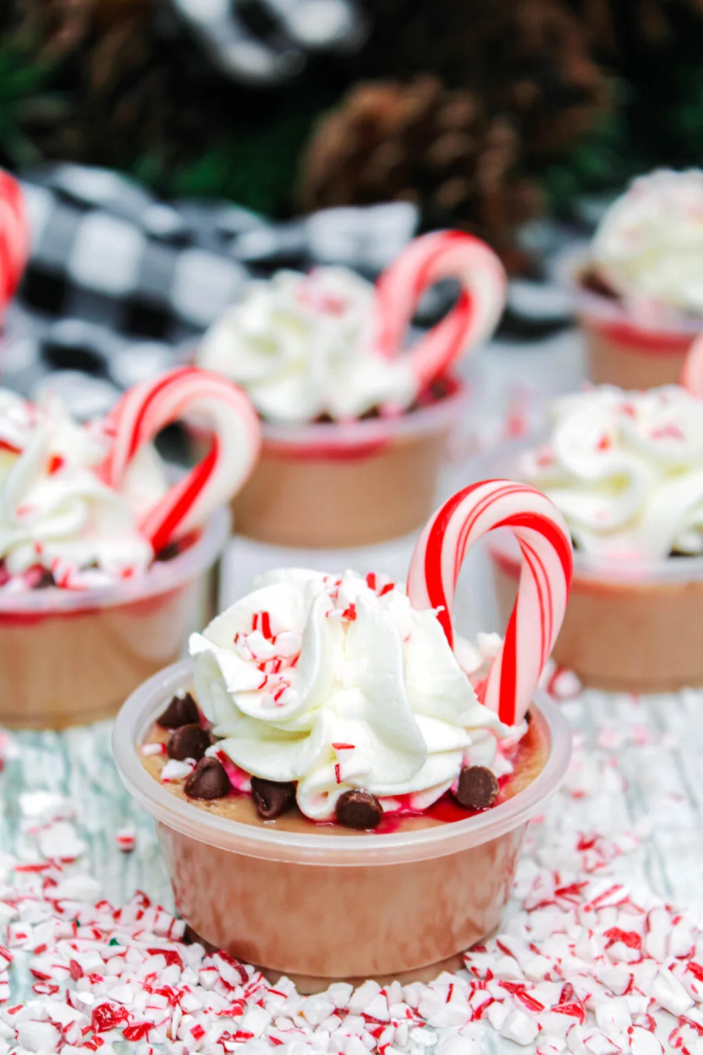 peppermint hot cocoa jello shots on table with christmas decor