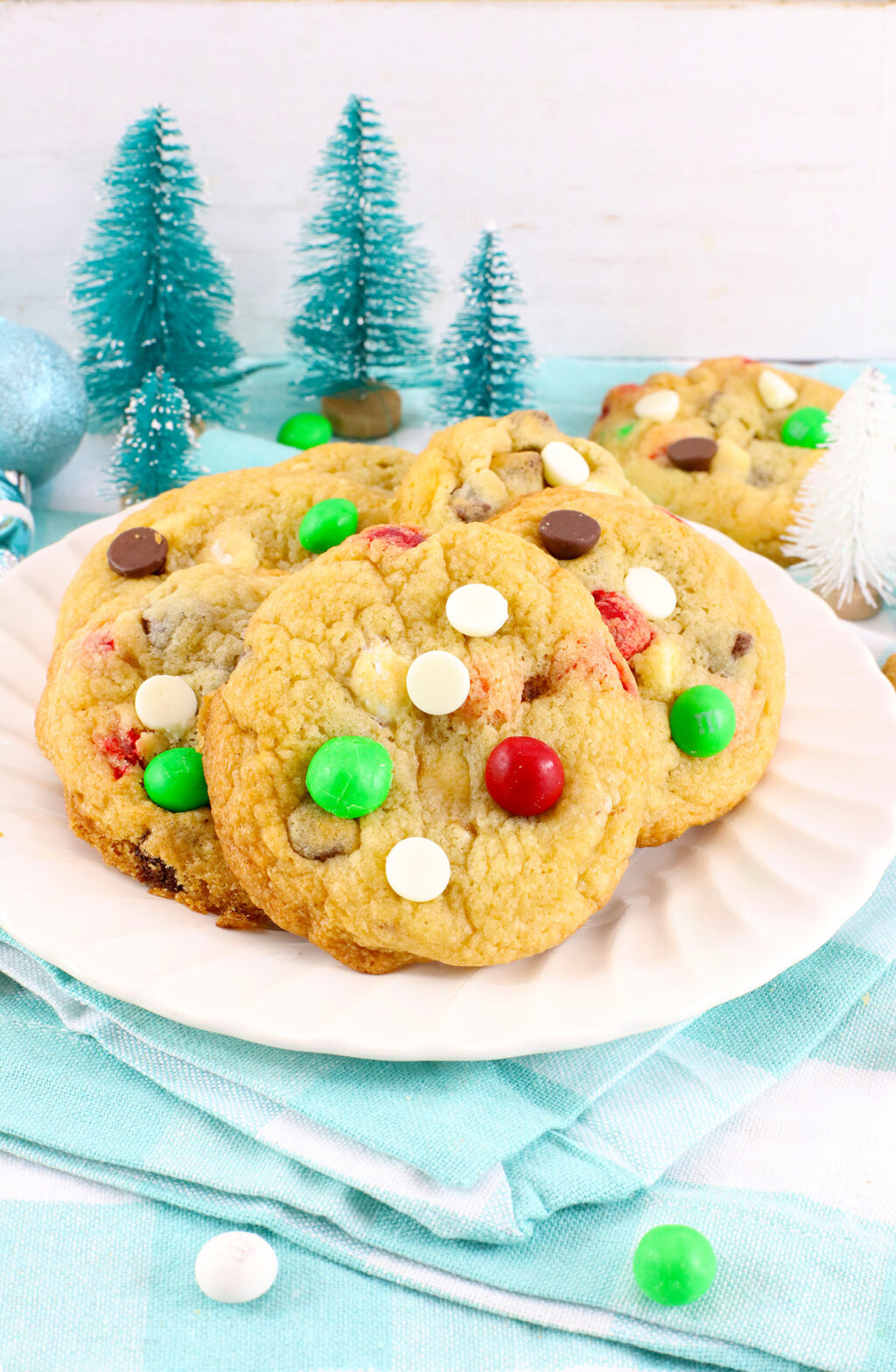 air fryer m&m christmas cookies on a white plate