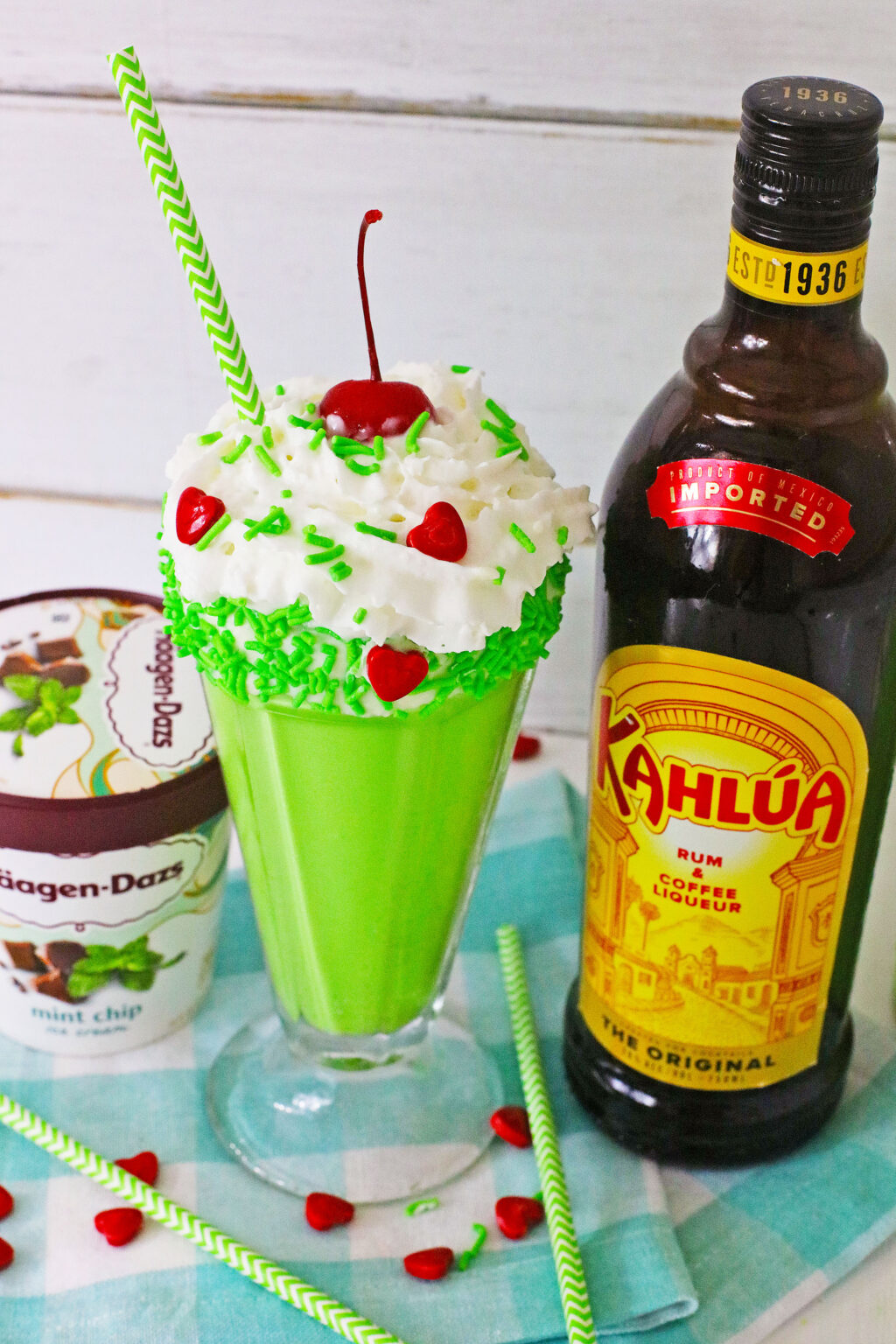 grinch milkshake on table with kahlua bottle
