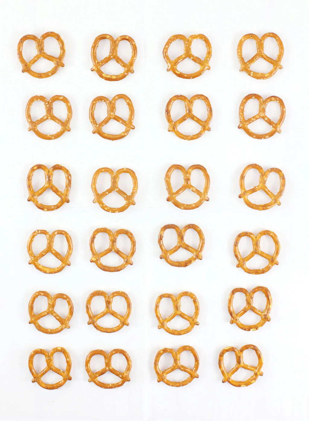 pretzel twists on parchment paper