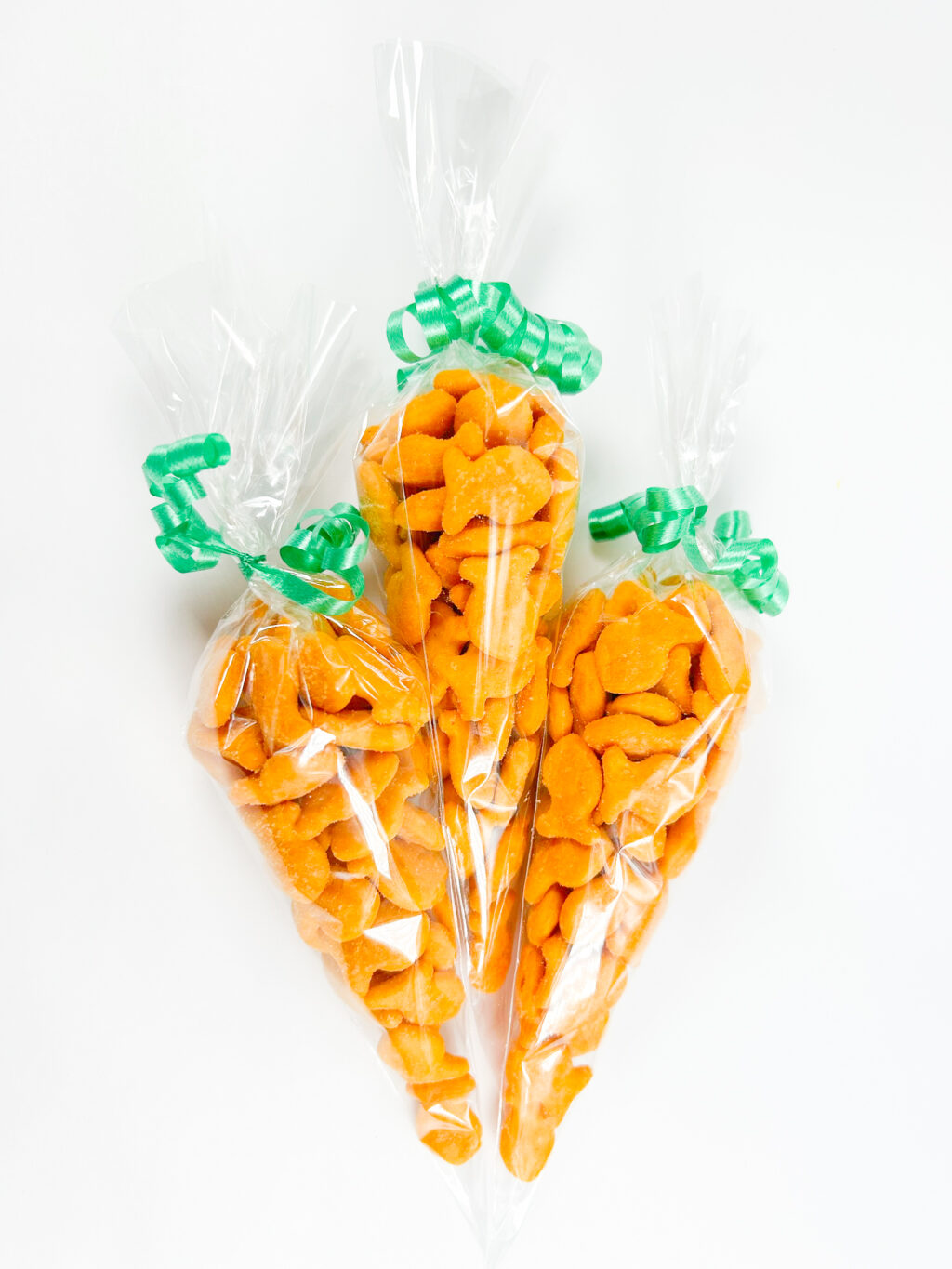goldfish carrot treat bags on white table