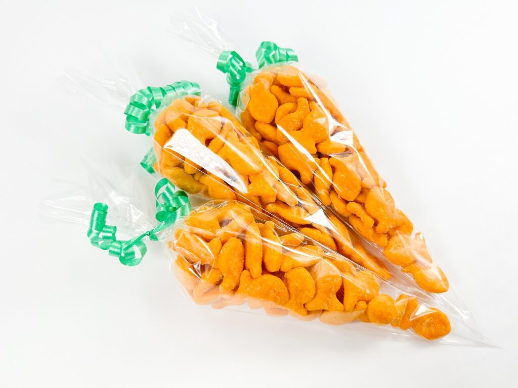 set of 3 goldfish carrot treat bags on white table