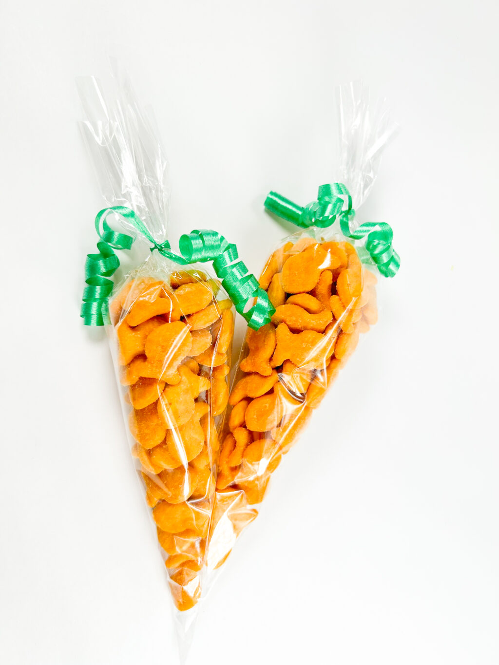 golfish carrot treat bags on white table