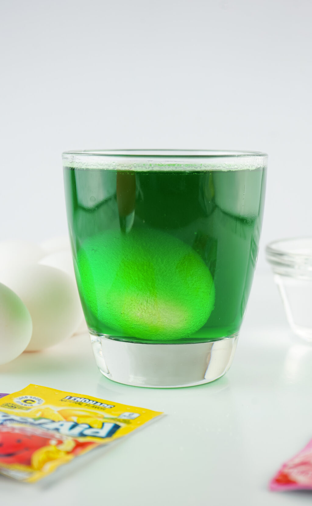 green kool-aid dyeing an egg