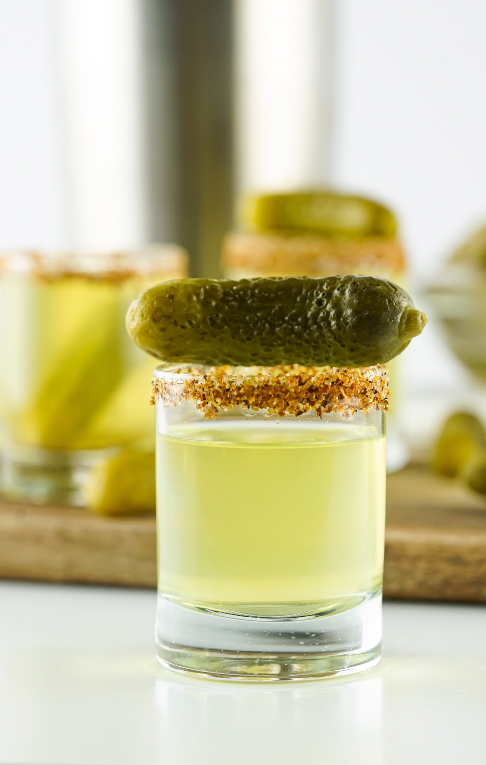 pickle shots with vodka and mini pickle on top