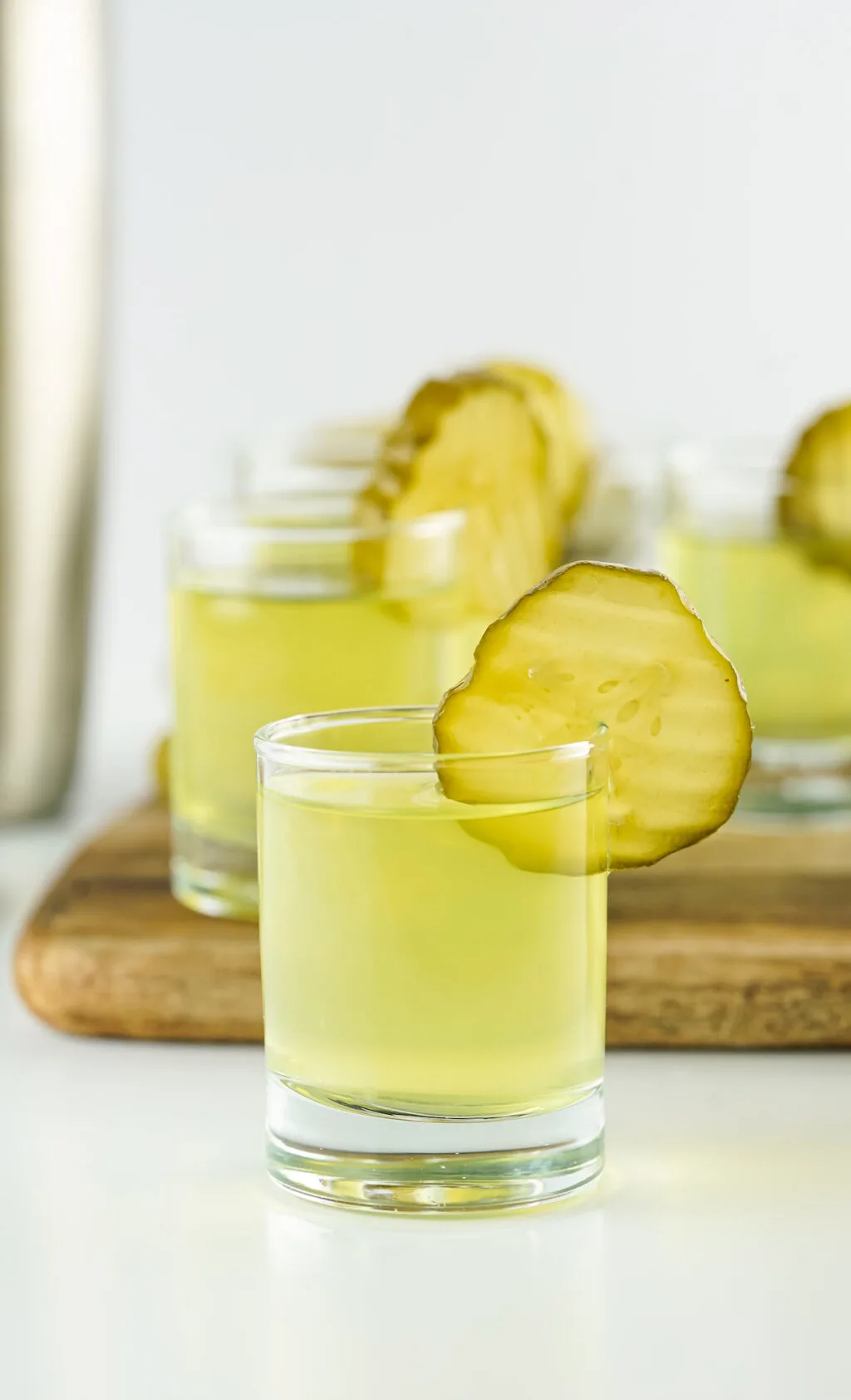 pickle shot with vodka on table