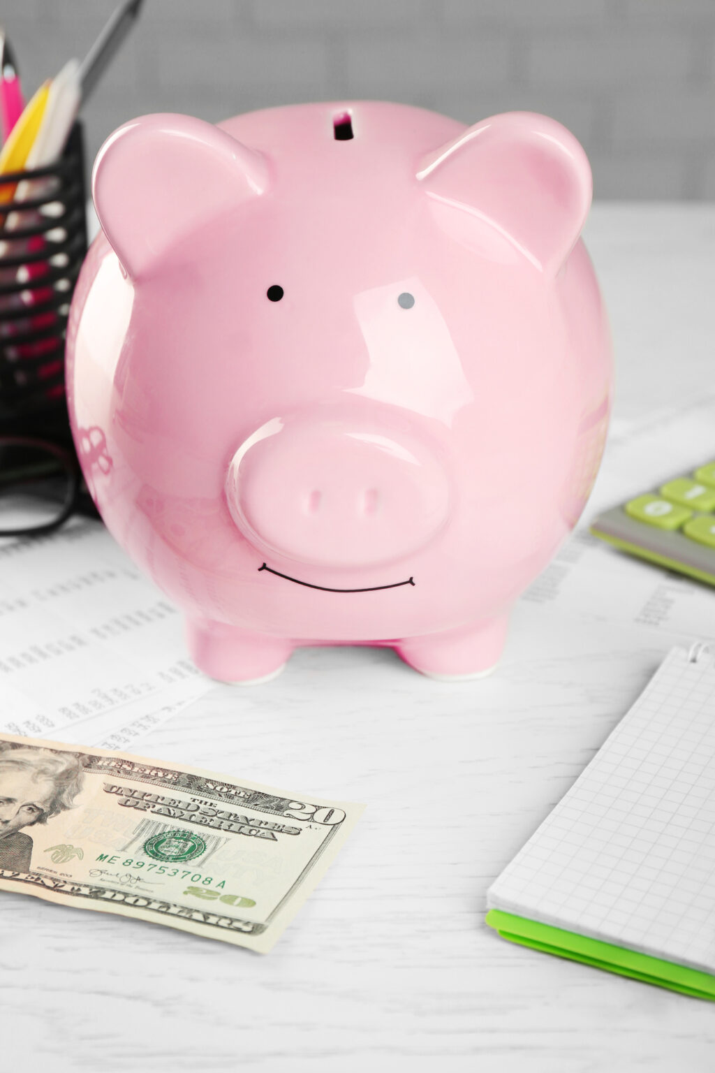 budget with pink piggy bank