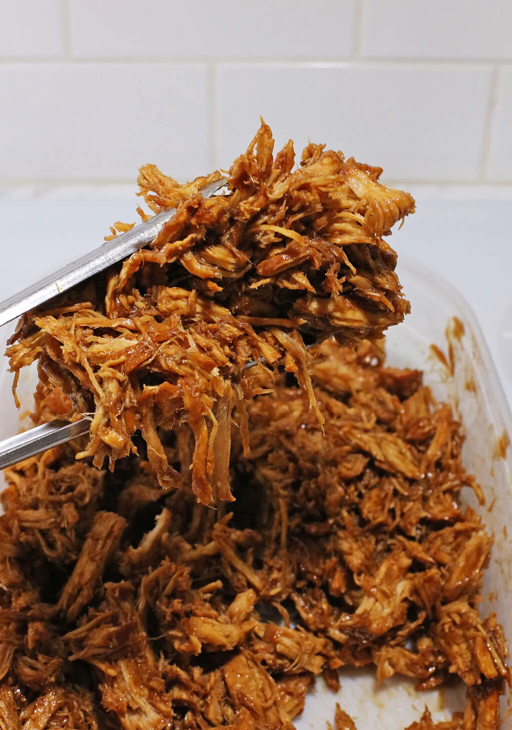 dr pepper pulled pork scoop with tongs