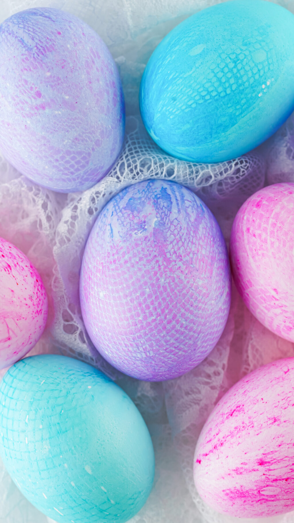 fabric dyed easter eggs on white fabric