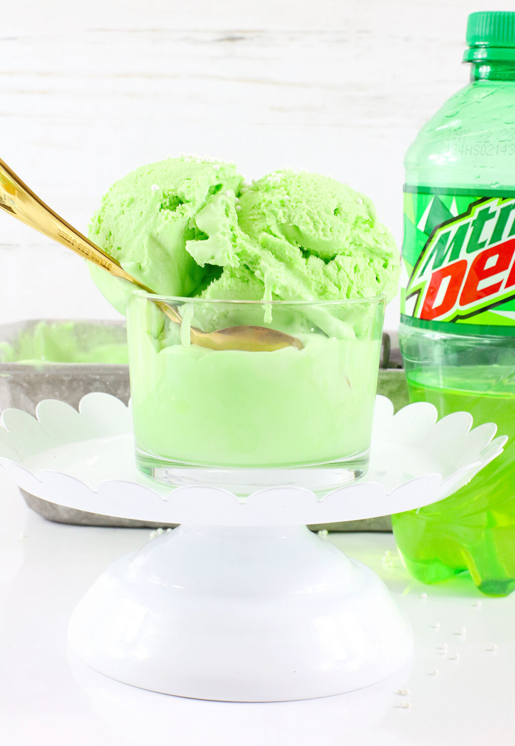 homemade mountain dew ice cream in a clear glass bowl