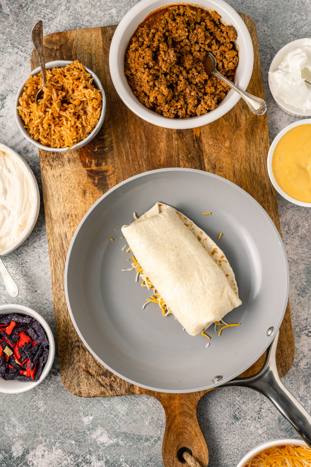 copycat taco bell grilled cheese burrito in frying pan