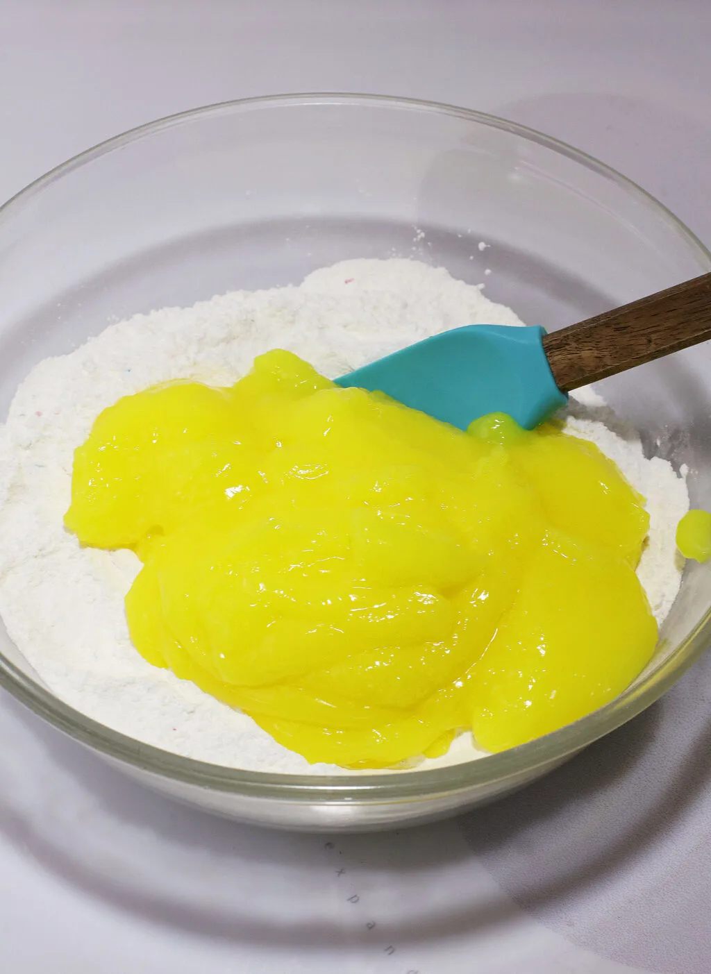 lemon pie filling in bowl of cake mix