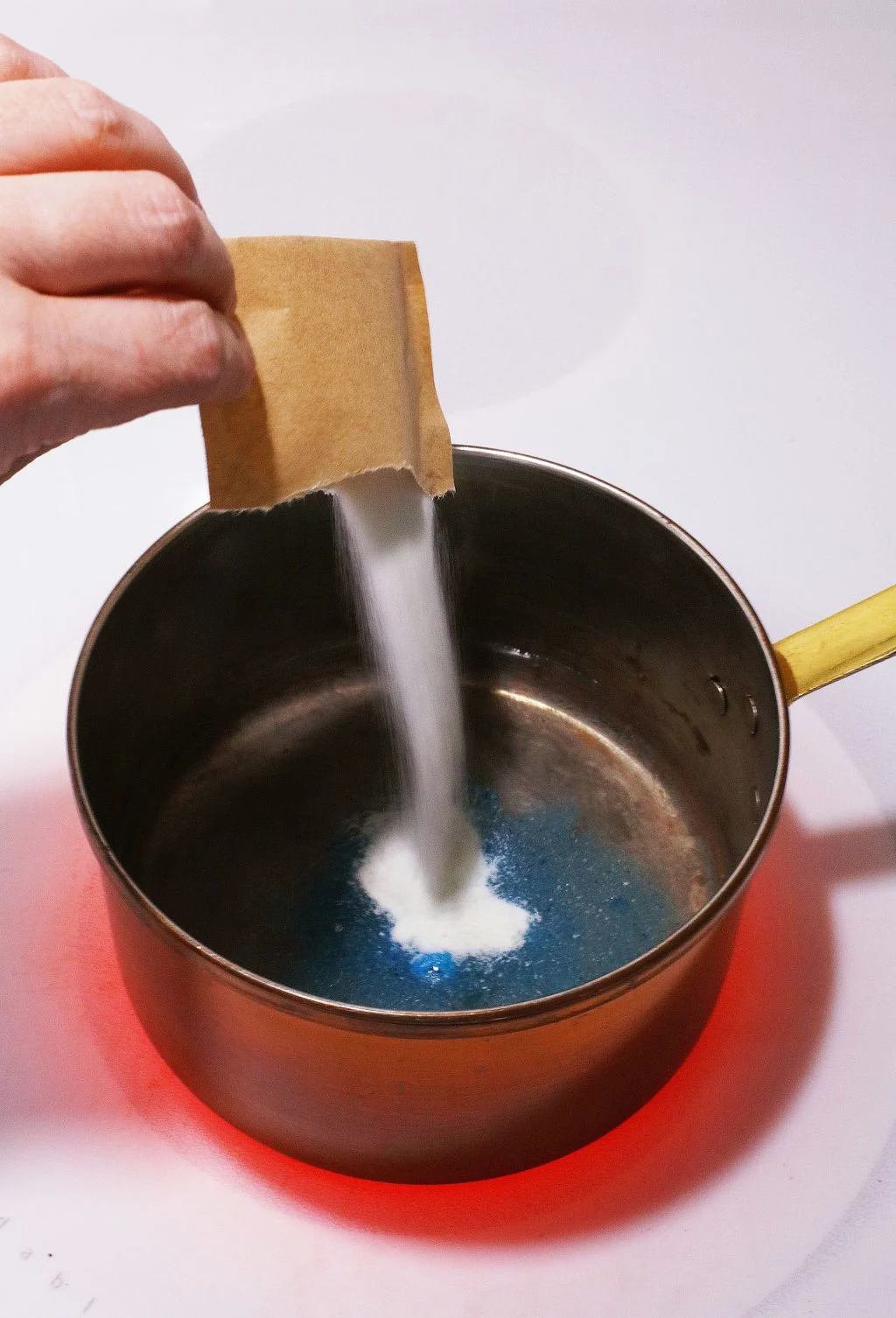 jello being poured into boiling water