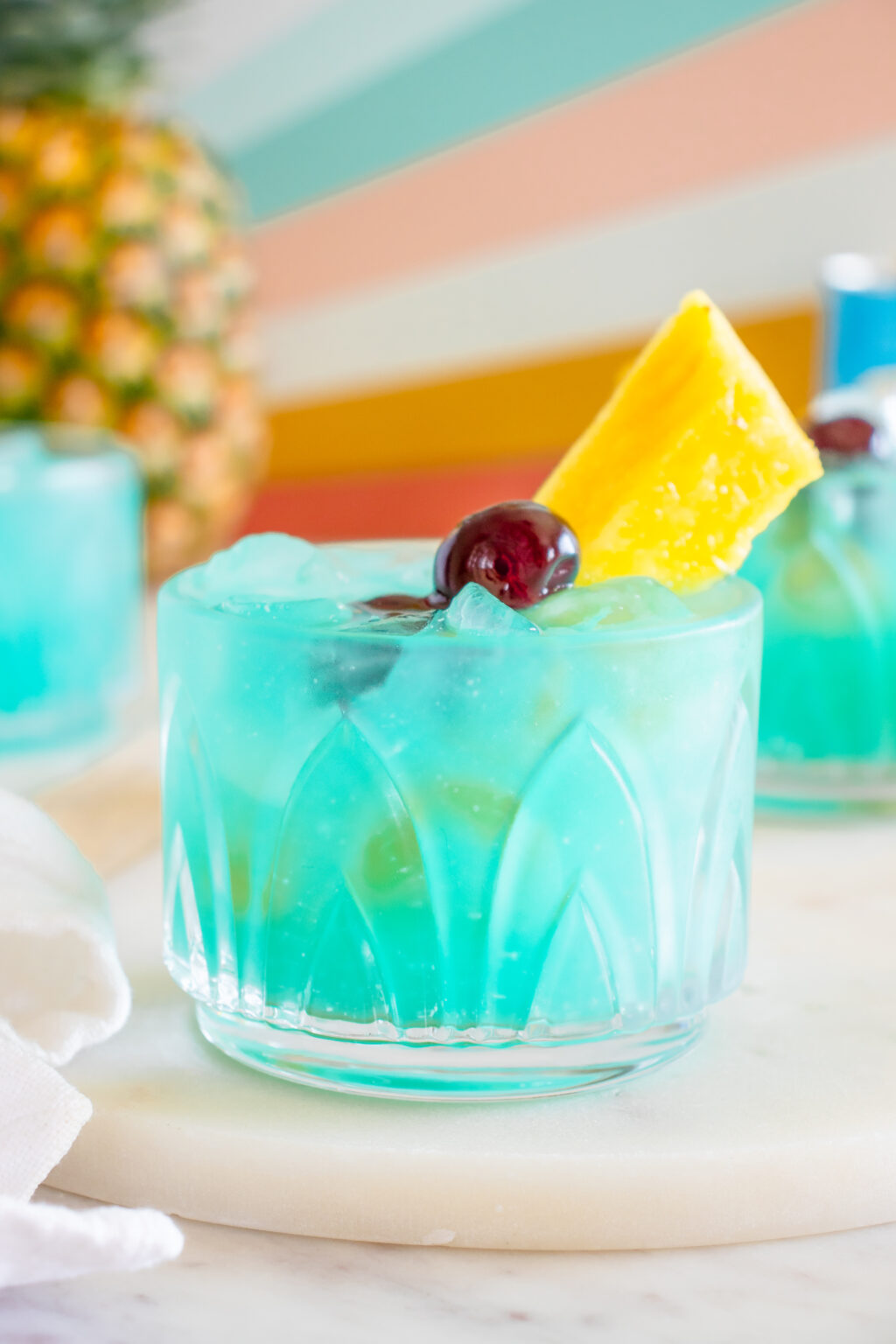 blue hawaiian cocktail in old fashioned glass