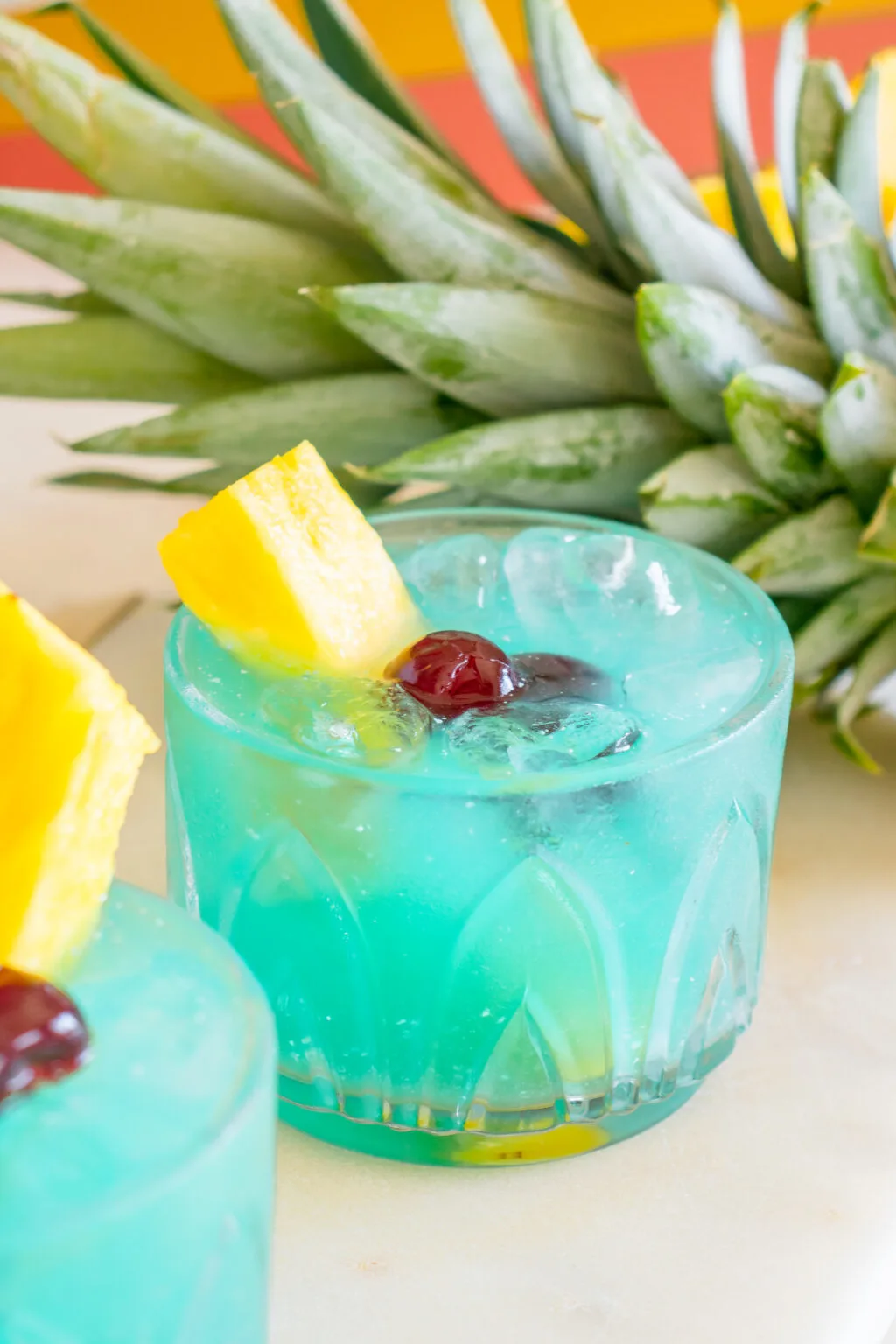 blue hawaiian cocktail on white table