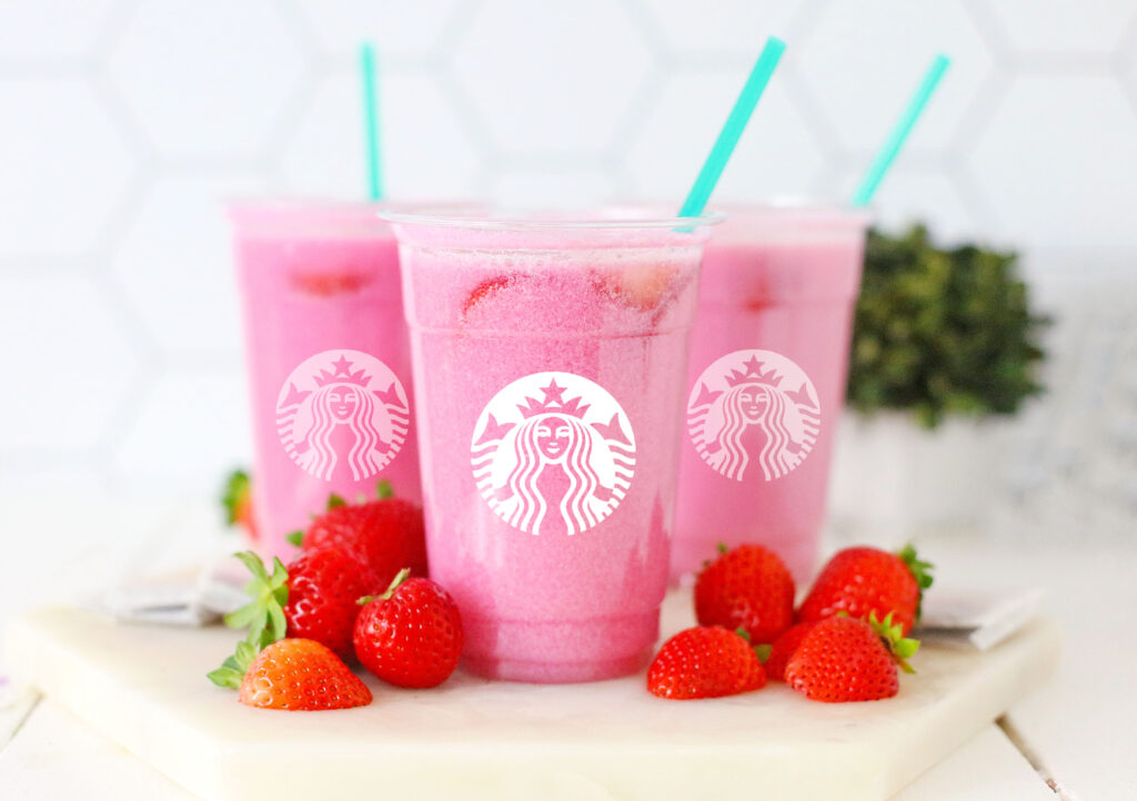 starbucks pink drink in cups at home