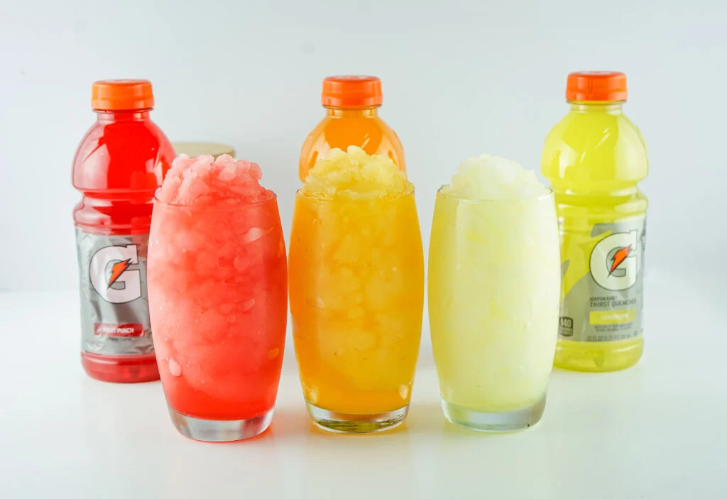 gatorade slushies with gatorade bottles on white table