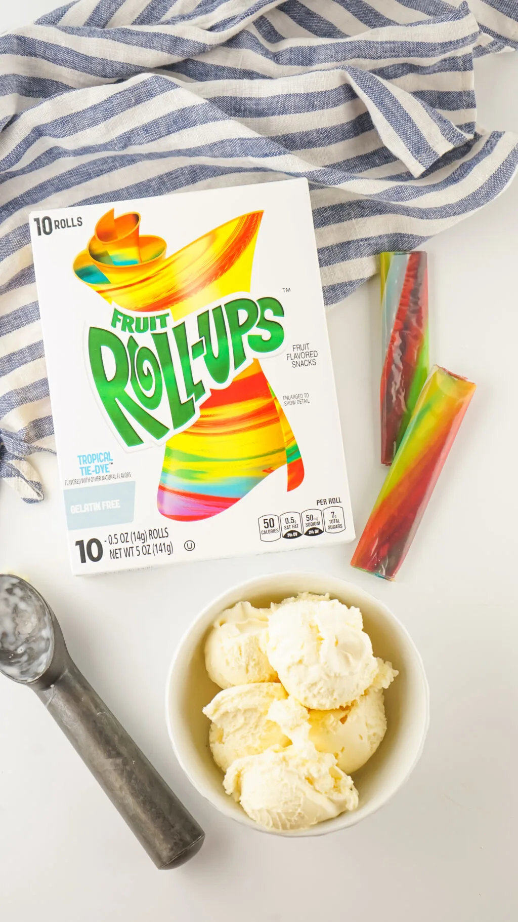 fruit roll-ups ice cream ingredients on white table