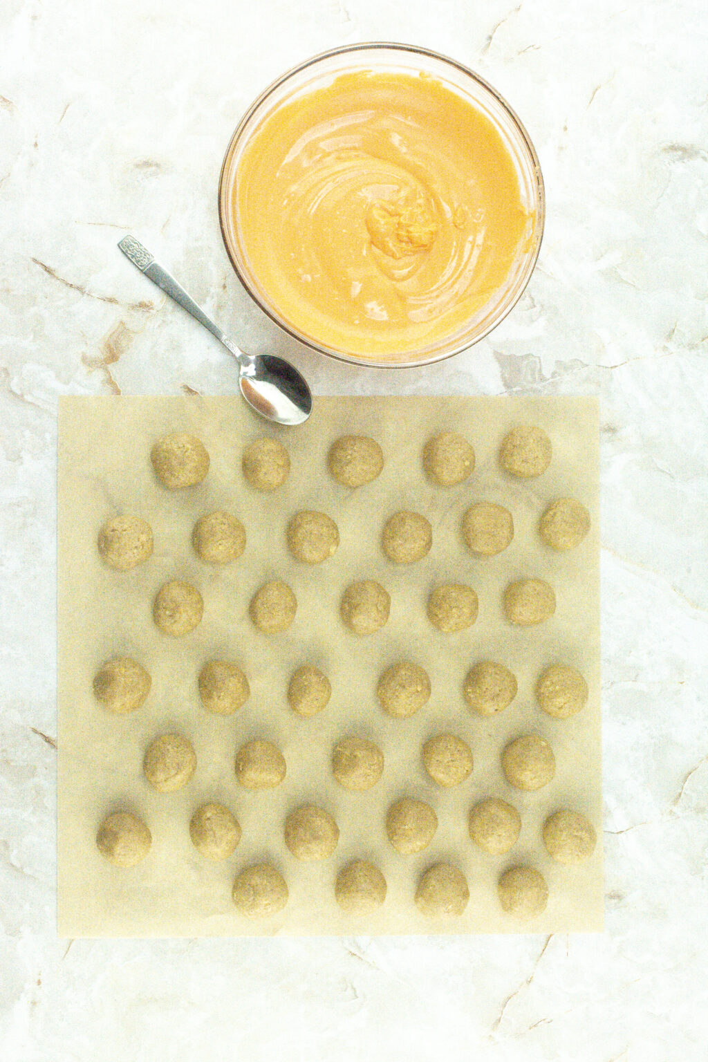 pumpkin pie truffle balls on baking sheet