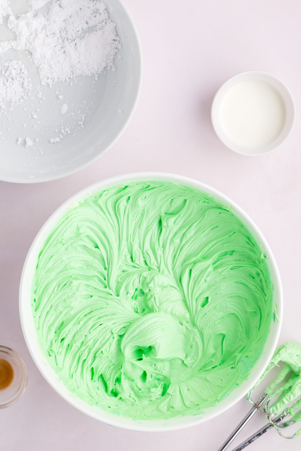 large bowl of freshly made green frosting