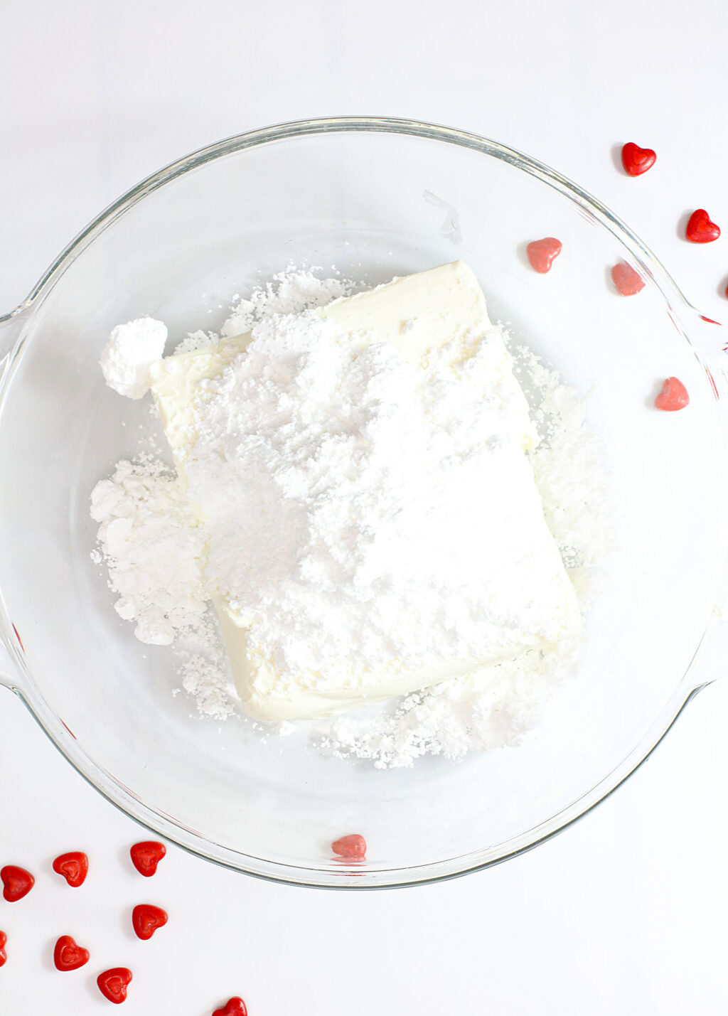 cream cheese and powdered sugar in large mixing bowl