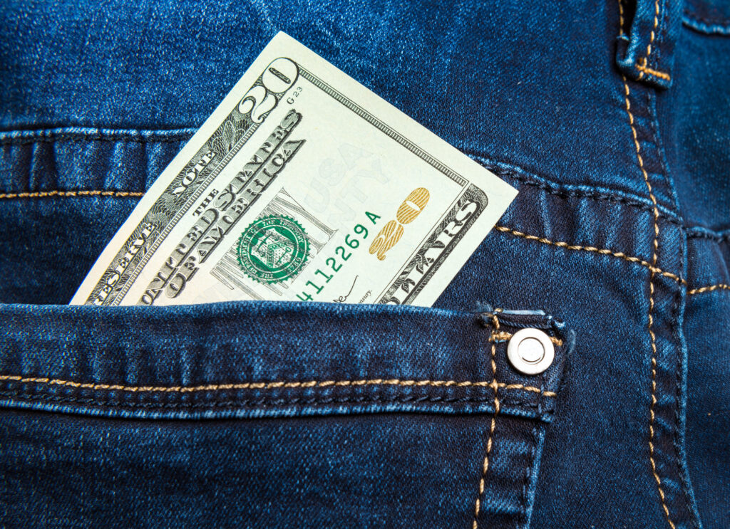 $20 bill in pocket of jeans