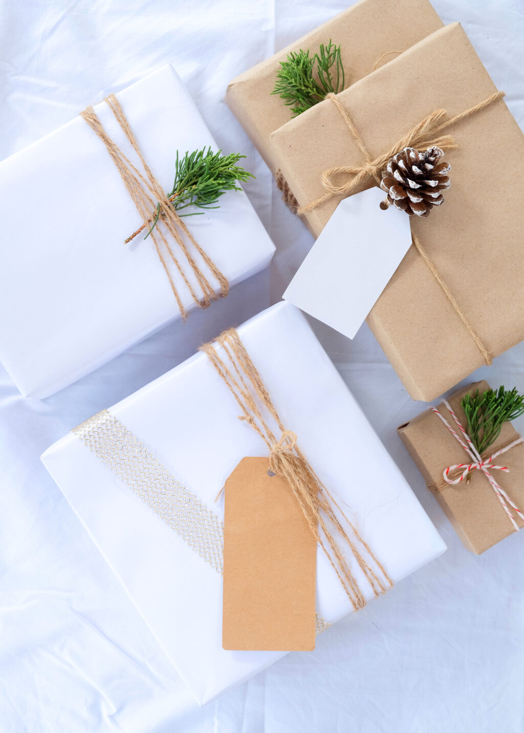minimalist holiday gifts wrapped in natural wrapping paper