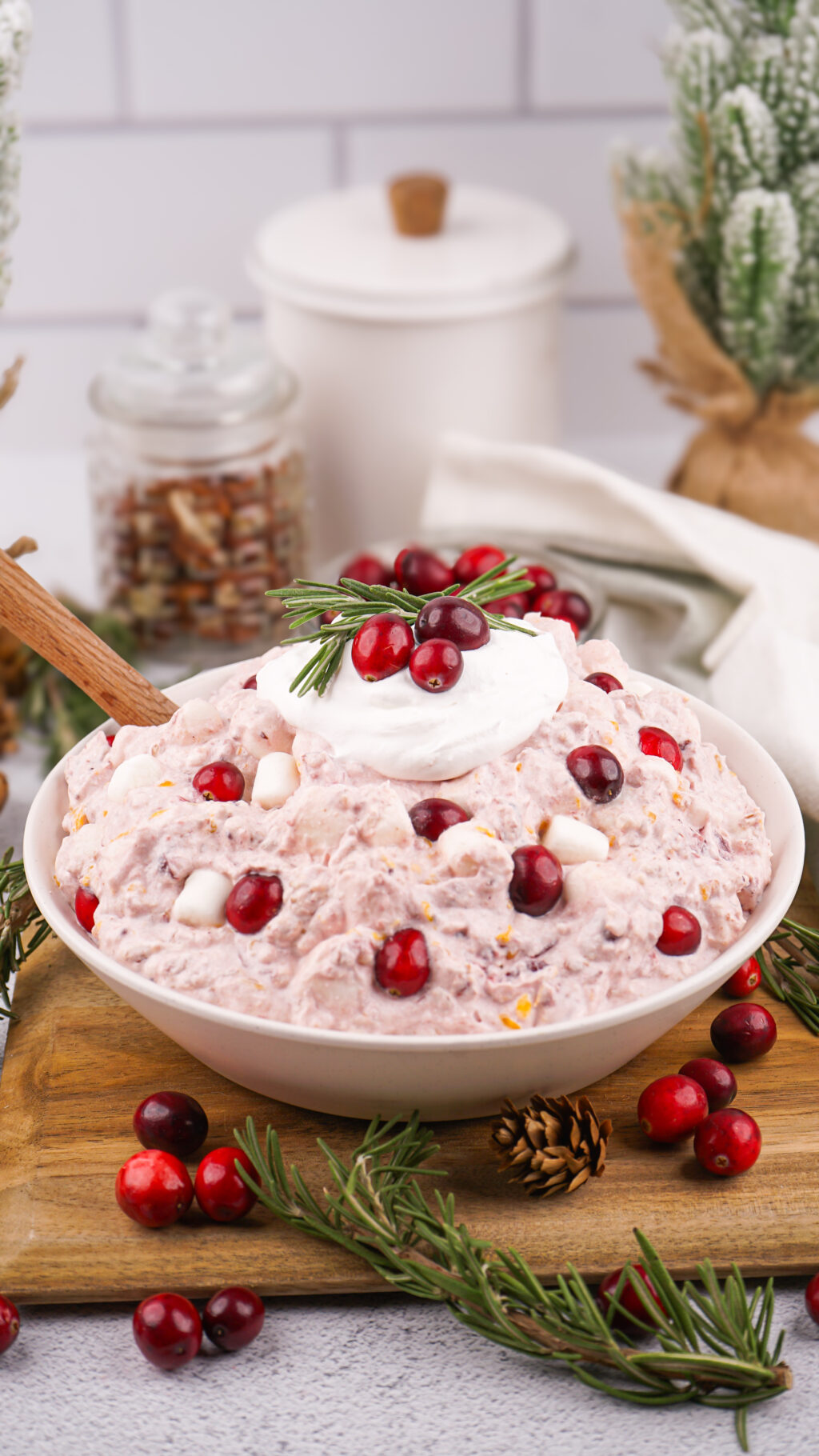 large white bowl full of cranberry fluff salad