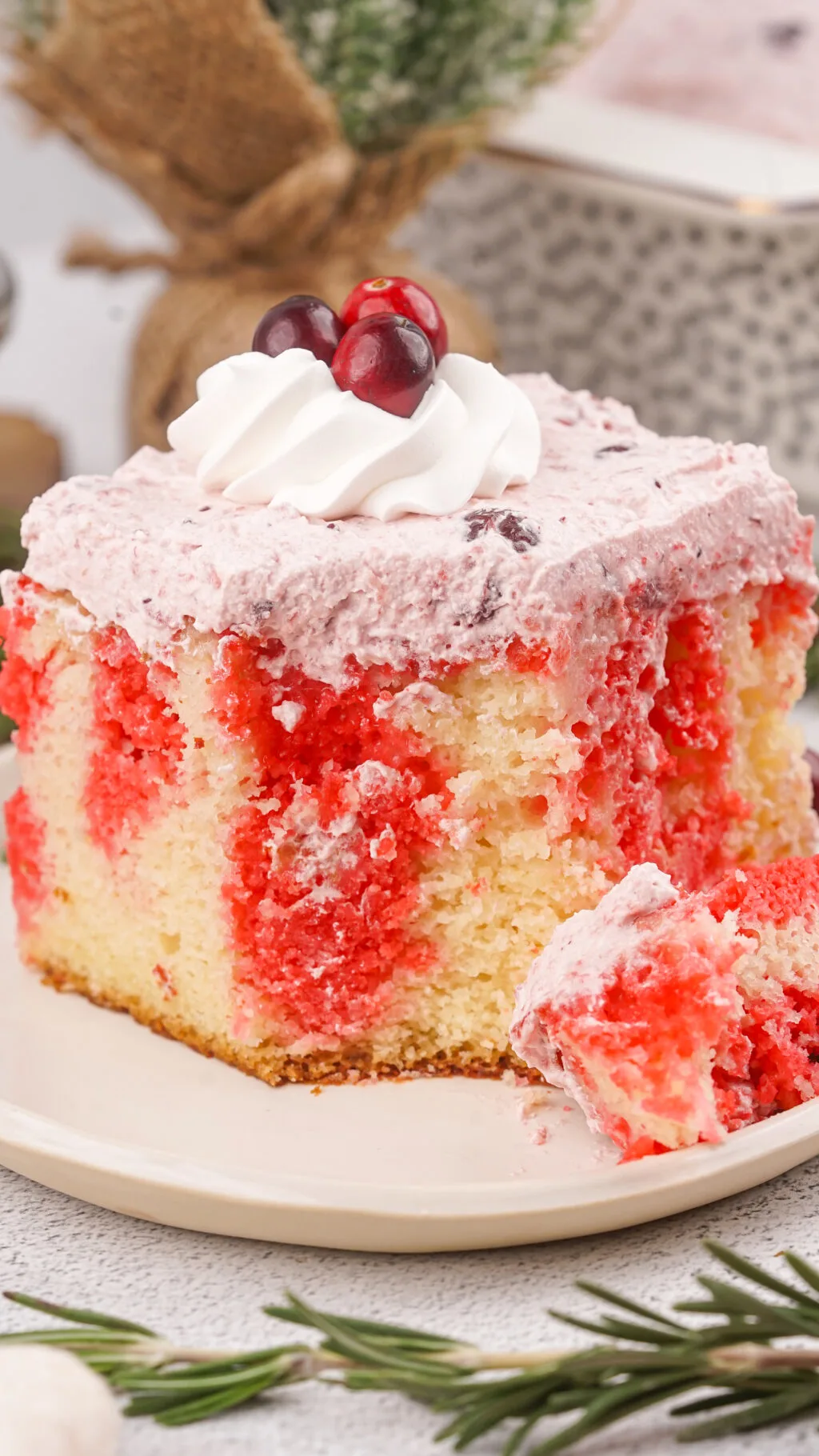 up close shot of cranberry poke cake slice