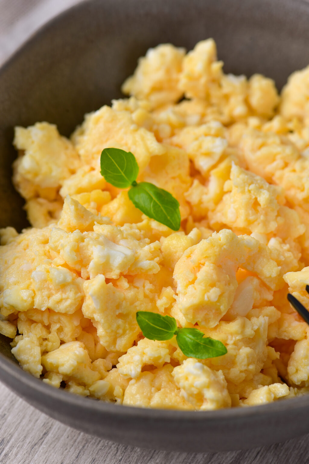 up close of bowl of microwave scrambled eggs