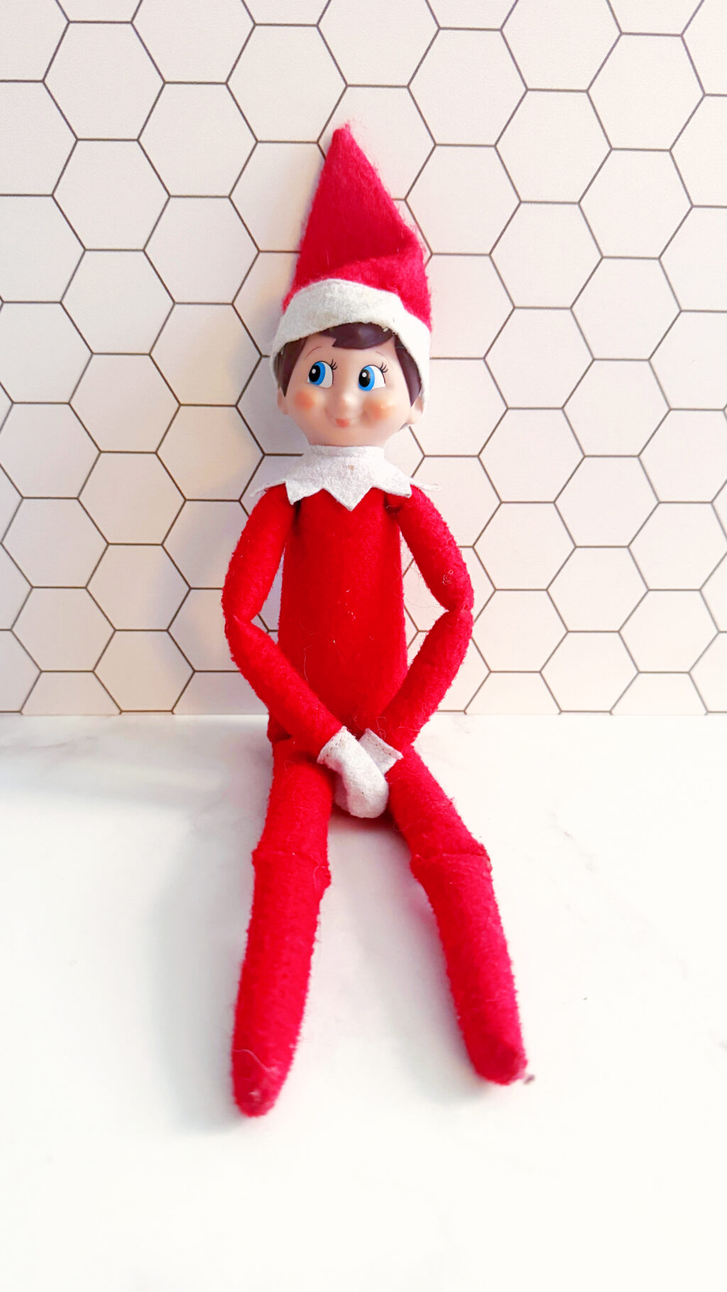 elf on the shelf arrival on white table