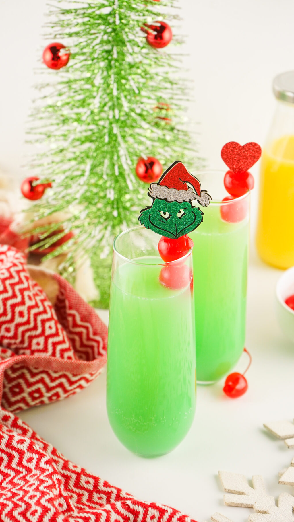 tall glass of grinch mimosa