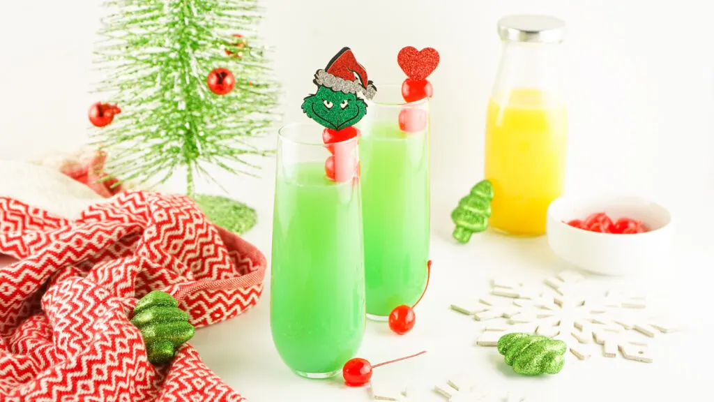 grinch mimosas on white table