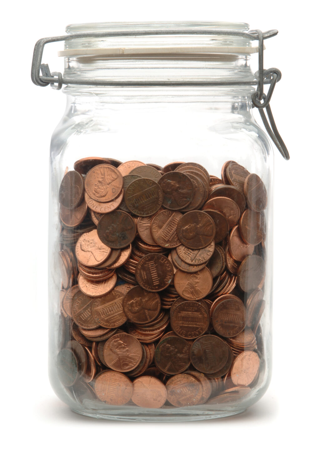 glass jar full of pennies for the penny challenge
